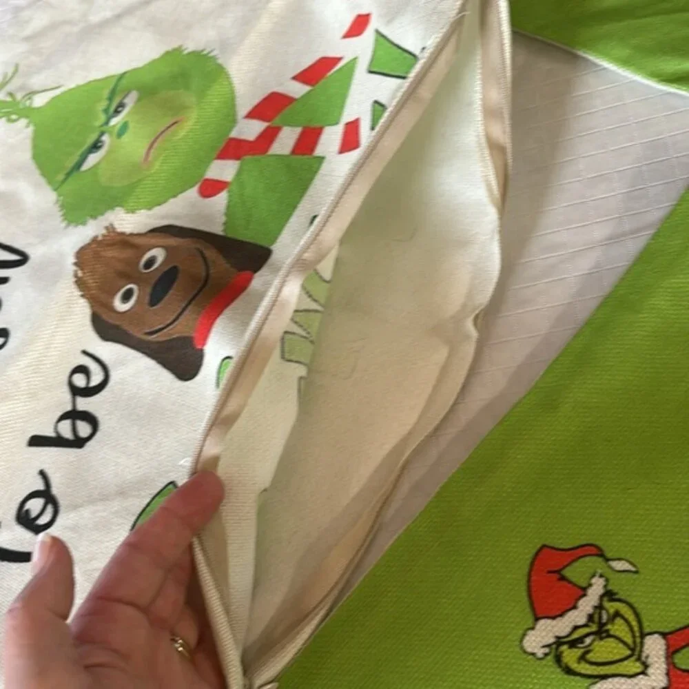Four 17 x 17 grinch pillow covers, with zipper closings